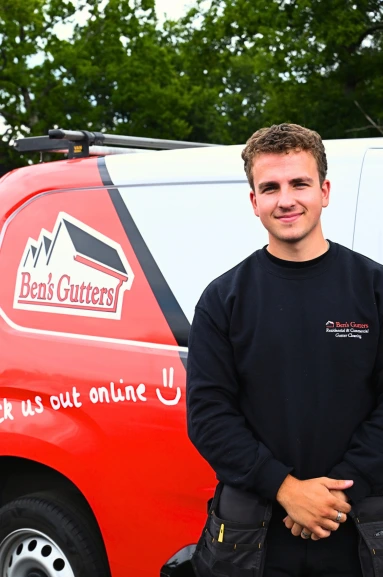 Our local gutter cleaner in Leigh standing beside company vehicle