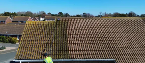 Roof cleaning a healthcare centre in Leigh